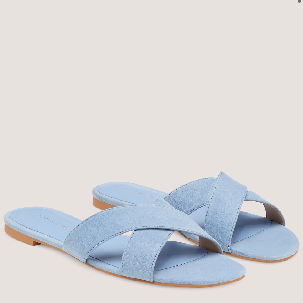 Brand new in box size 6 Stewart Weisman sandals in blue.